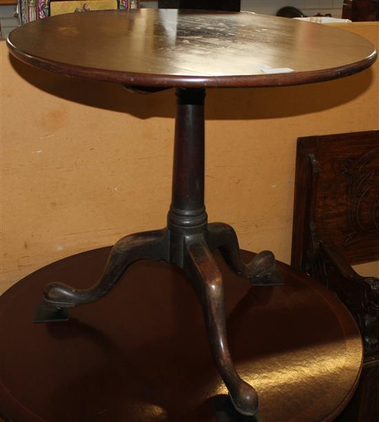 Circular mahogany snap-top table